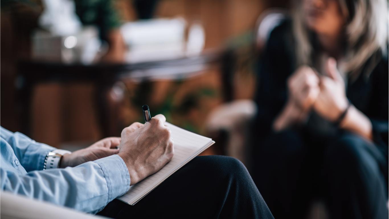Sup 4 Male hands holding a printed document